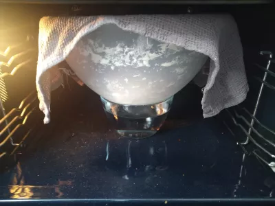 Fluffy Coco Bread Recipe - Vegan Tahitian Specialty : Coco bread dough ball inflating in an oven